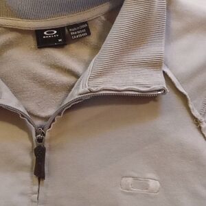 Oakley tan long sleeve full zip jacket with pockets Size Medium